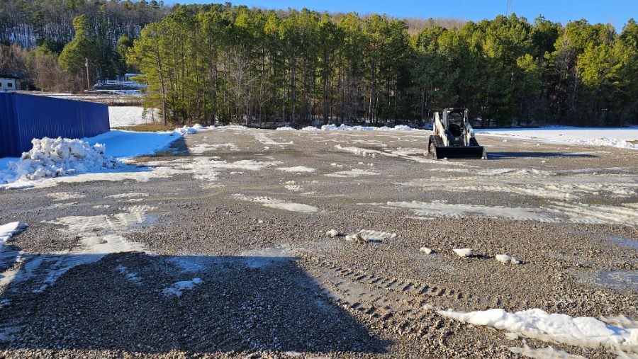 Gravel parking area cleared during winter weather